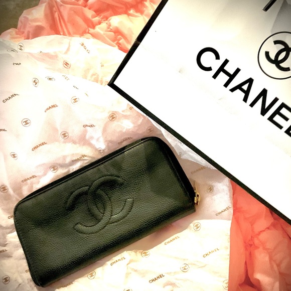 CHANEL Handbags - Chanel black caviar leather full zip around wallet in guc